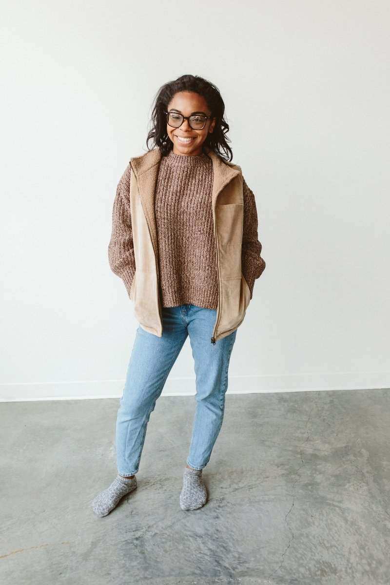 ADULT SHERPA/CORDUROY REVERSIBLE VEST in beige with a soft sherpa lining and corduroy exterior, worn open