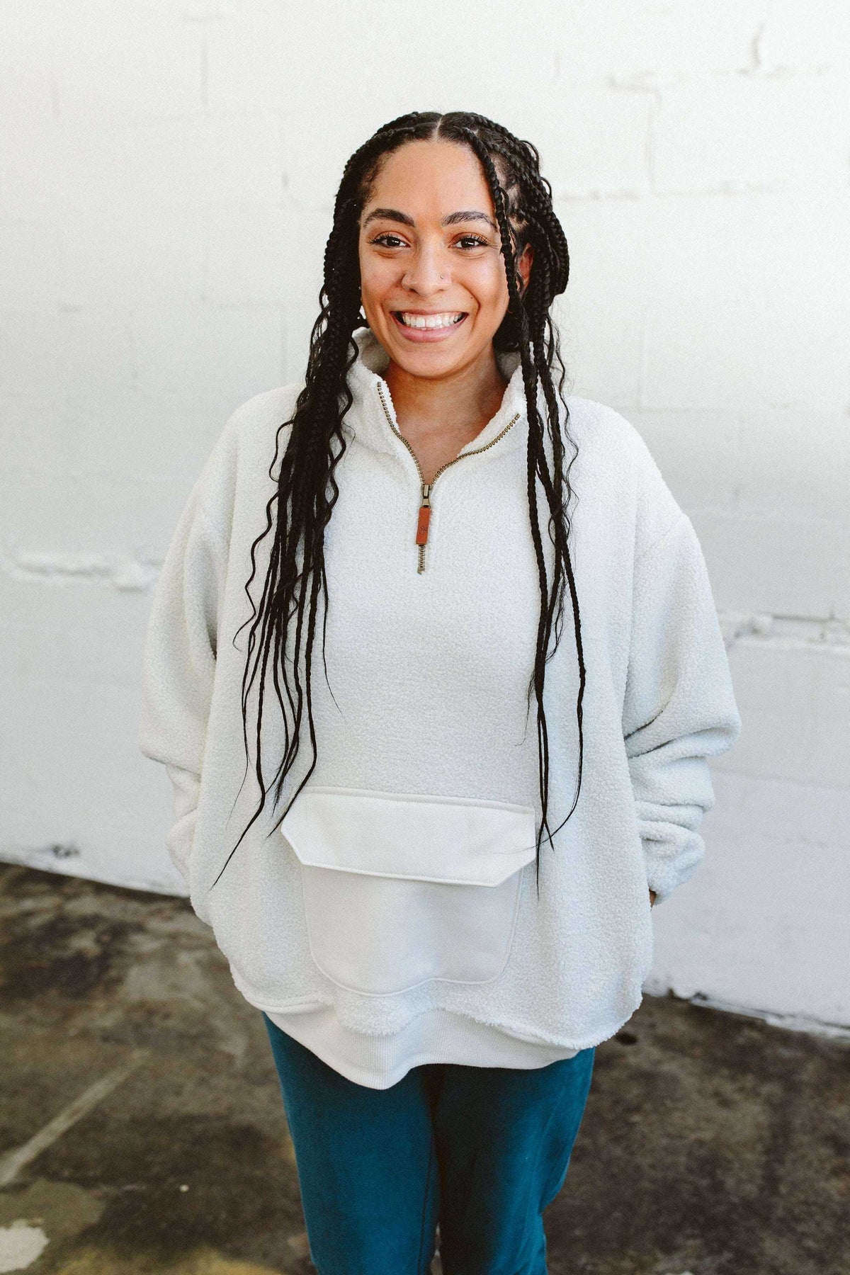 ADULT SHERPA ZIP PULLOVER in alabaster white plush fleece, with a short front zip and a large kangaroo pocket