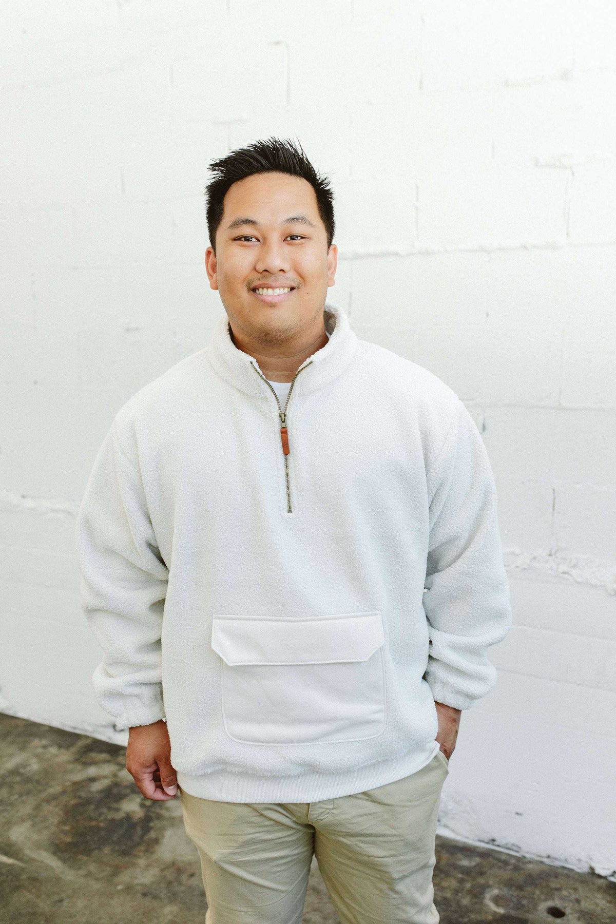 ADULT SHERPA ZIP PULLOVER in alabaster white plush sherpa with a half-zip collar and large front pocket