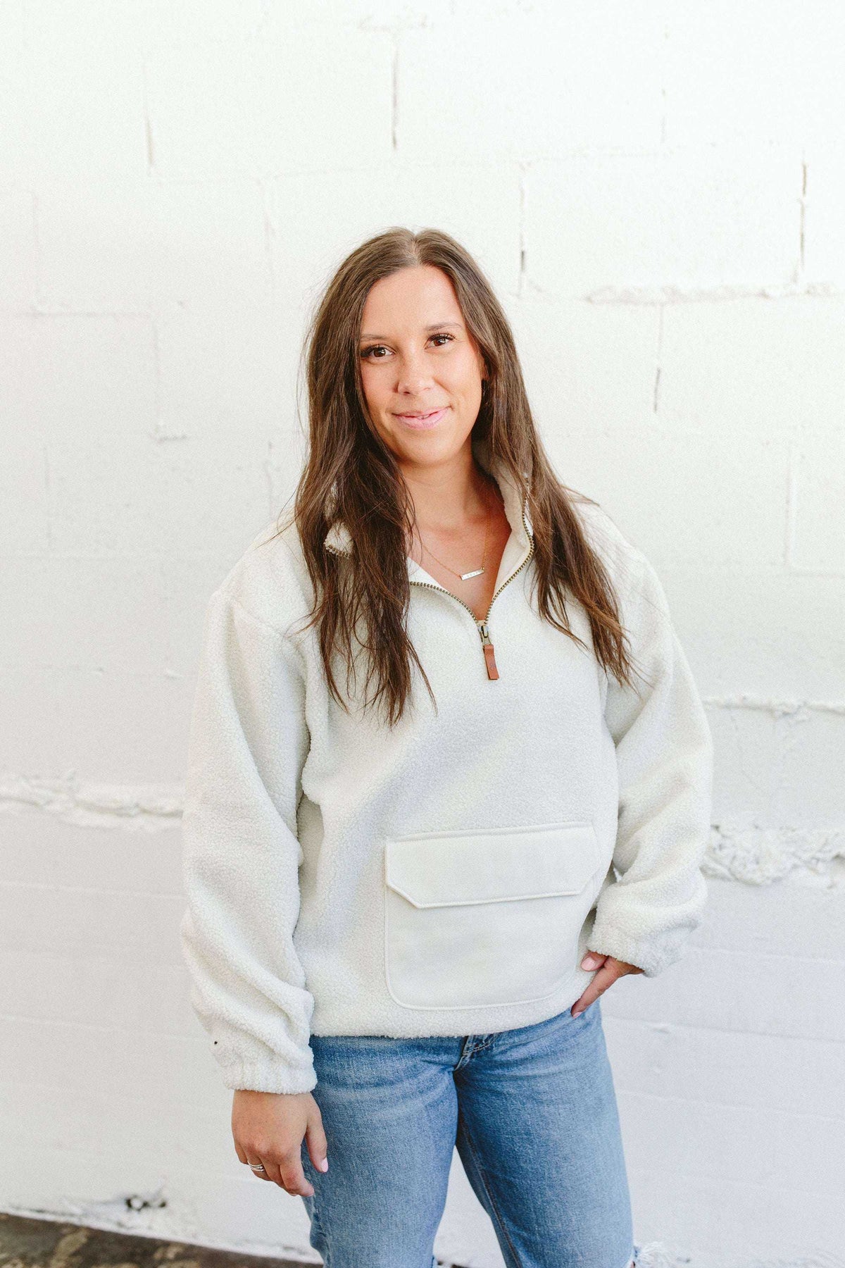 ADULT SHERPA ZIP PULLOVER in alabaster white, plush sherpa with a half-zip collar and large front pocket