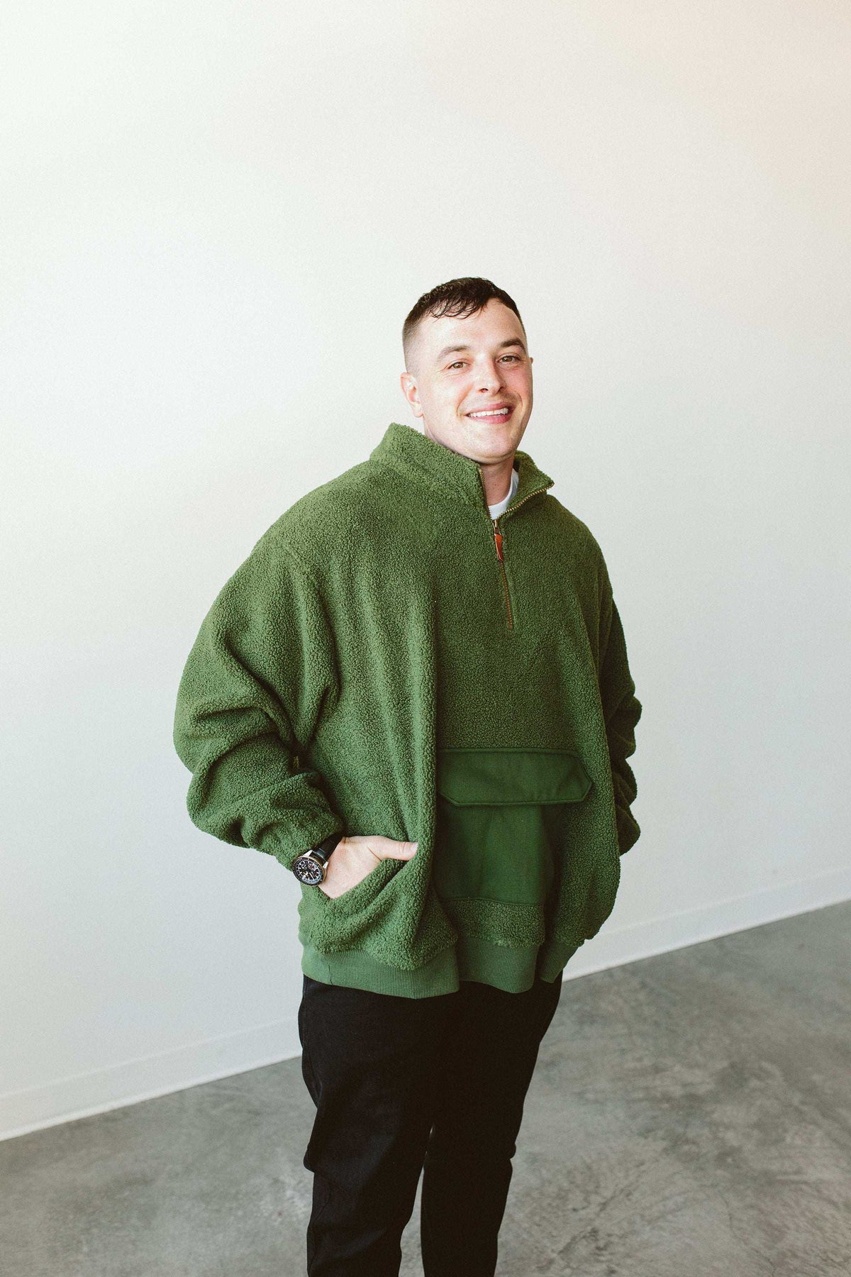 Adult Sherpa Zip Pullover in forest green plush fleece, featuring a quarter-zip collar and large front pouch pocket