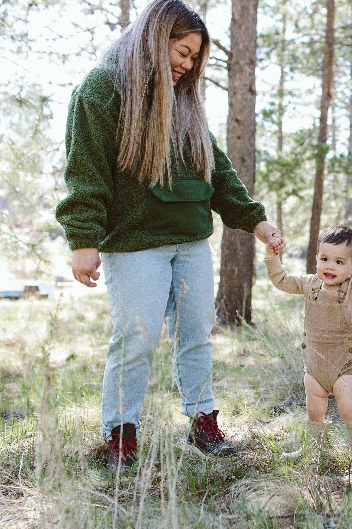 Adult Sherpa Zip Pullover in deep spruce green plush sherpa, with a half-zip neckline, kangaroo pocket and elastic cuffs