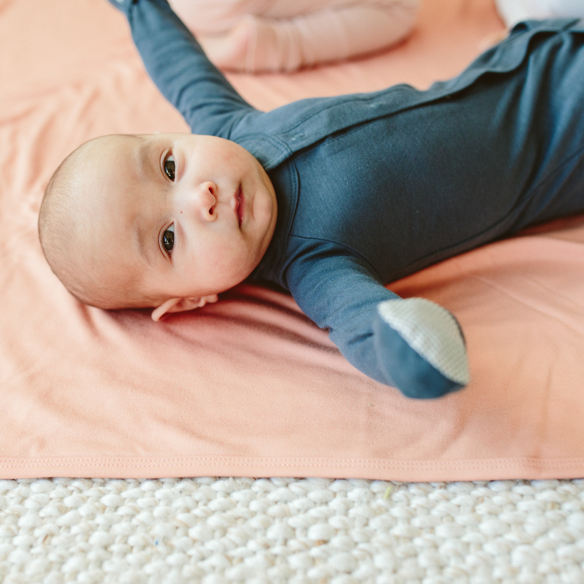 PREEMIE 24 HOUR CONVERTIBLE GOWN in deep blue soft fabric with pale patterned built-in mitts and a snap front