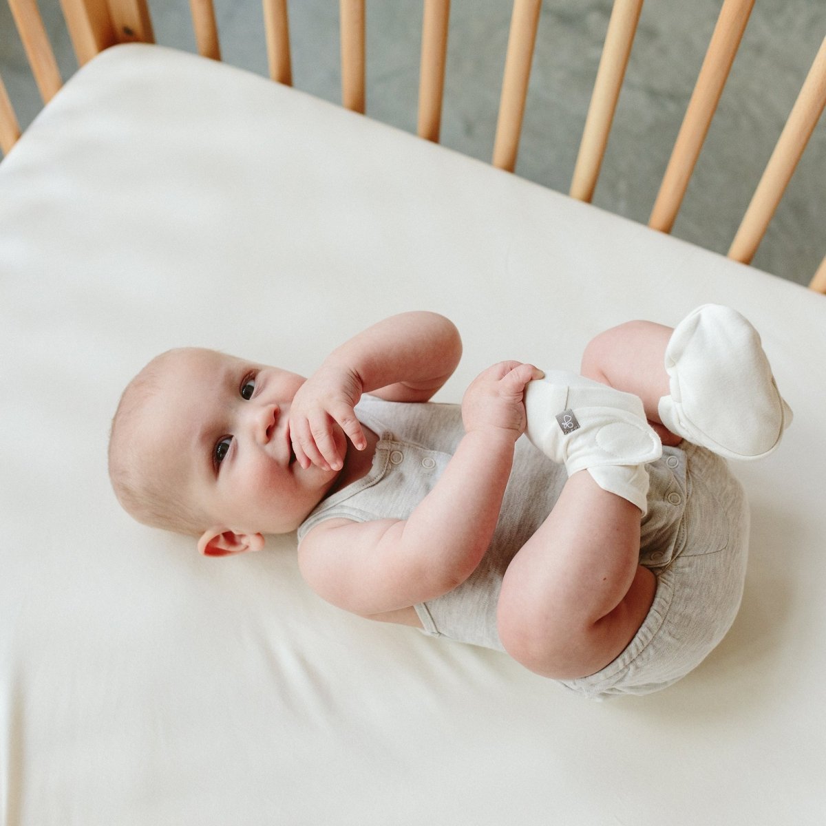 Goumi Kids Cloud Baby Layette Gift Set – stay-on mitts & boots, convertible sleeper gown, grow-with-you footie, gift-packaged – detail