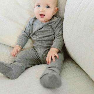 STAY ON 2-PACK BOOTS shown as soft gray baby booties with a simple solid-color design, worn by an infant