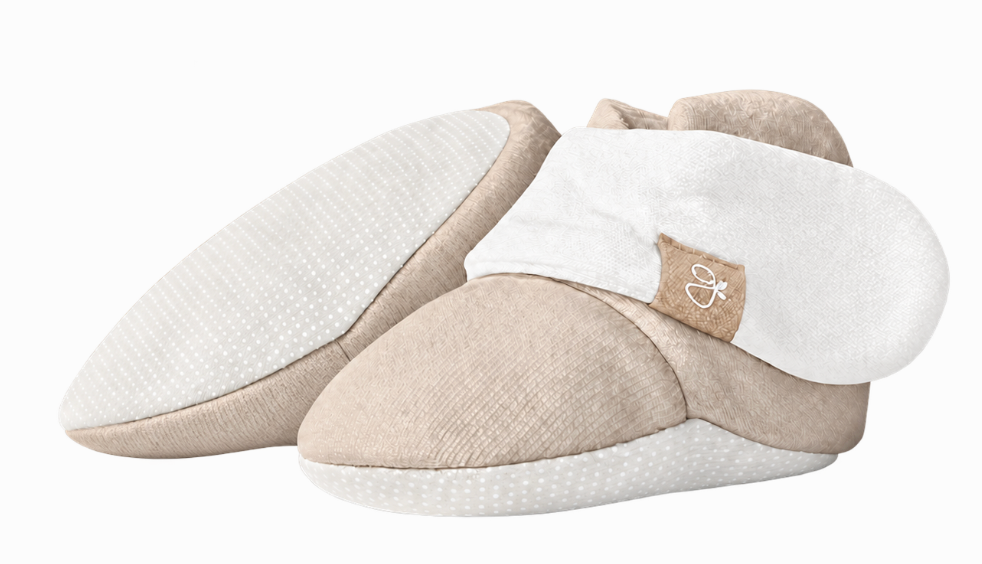 STAY ON BOOTS in soft beige and cream fabric with a subtle dotted pattern and adjustable wrap closure