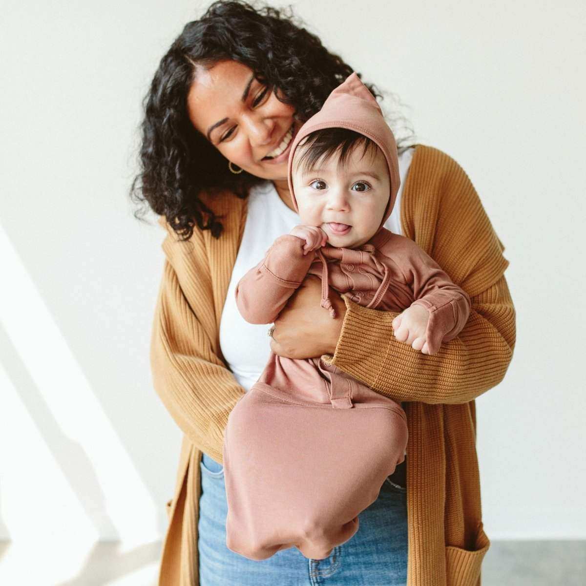 24 HOUR CONVERTIBLE GOWN in dusty rose, with a hood, long sleeves, patterned fold-over mitts and a snap-close foot pouch