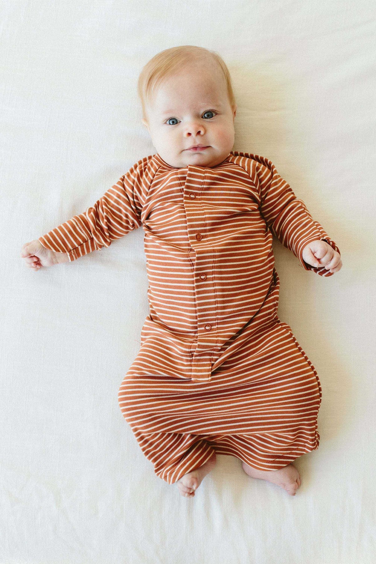 24 HOUR CONVERTIBLE GOWN in rust clay with fine cream stripes, soft fabric and a snap-front design