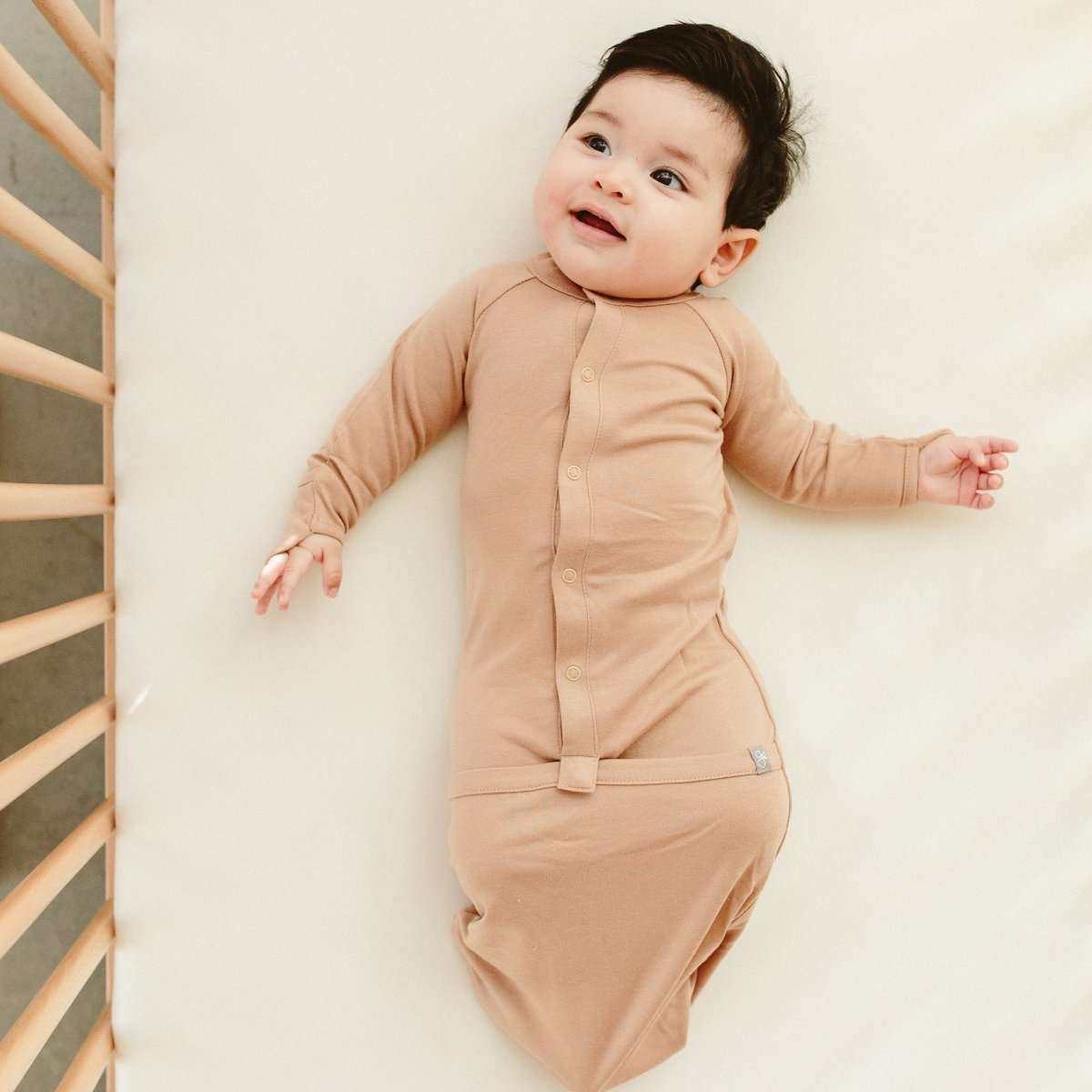 24 HOUR CONVERTIBLE GOWN in sandstone, soft solid-color fabric with long sleeves, front snaps and a convertible sack hem
