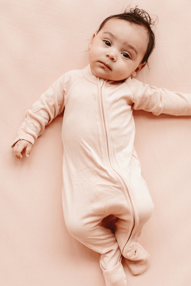 Goumi Kids ROSE Grow With You Baby Footie – bamboo viscose organic cotton blend, 0–6M – flat lay