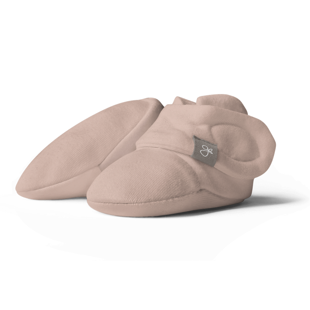 Preemie Sleep Set includes soft rose-colored fabric preemie boots with folded cuffs and a small branded tag